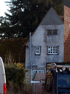 Bell Farmhouse glimpsed from the road March 2010